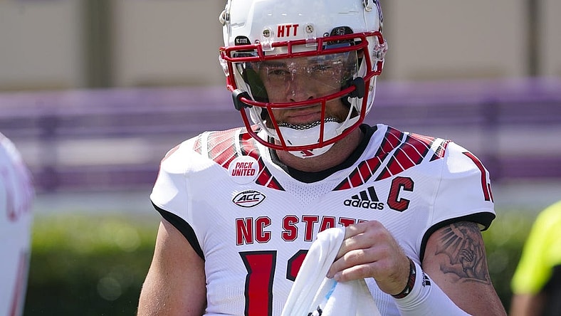 Sep 3, 2022; Greenville, North Carolina, USA;  North Carolina State Wolfpack quarterback Devin Leary (13) looks on against the East Carolina Pirates before the game at Dowdy-Ficklen Stadium. Mandatory Credit: James Guillory-USA TODAY Sports