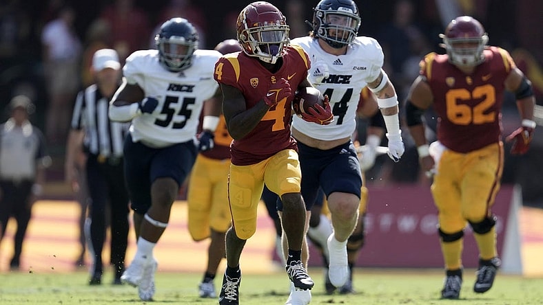 Sep 3, 2022; Los Angeles, California, USA; Southern California Trojans receiver Max Williams (4) carries the ball against the Rice Owls at United Airlines Field at Los Angeles Memorial Coliseum. Mandatory Credit: Kirby Lee-USA TODAY Sports