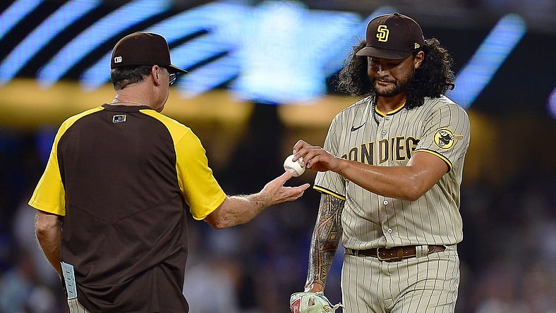 Sep 3, 2022; Los Angeles, California, USA; San Diego Padres starting pitcher Sean Manaea (55) is pulled from the game by manager Bob Melvin (3) against the Los Angeles Dodgers during the fifth inning at Dodger Stadium. Mandatory Credit: Gary A. Vasquez-USA TODAY Sports