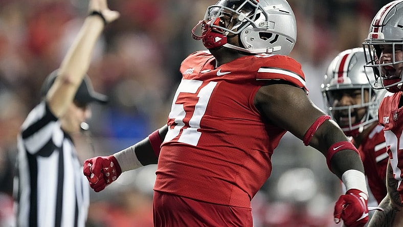 Sep 3, 2022; Columbus, Ohio, USA; Ohio State Buckeyes defensive tackle Michael Hall Jr. (51) celebrates after sacking Notre Dame Fighting Irish quarterback Tyler Buchner (not pictured) in the fourth quarter at Ohio Stadium. Mandatory Credit: Kyle Robertson-USA TODAY Sports