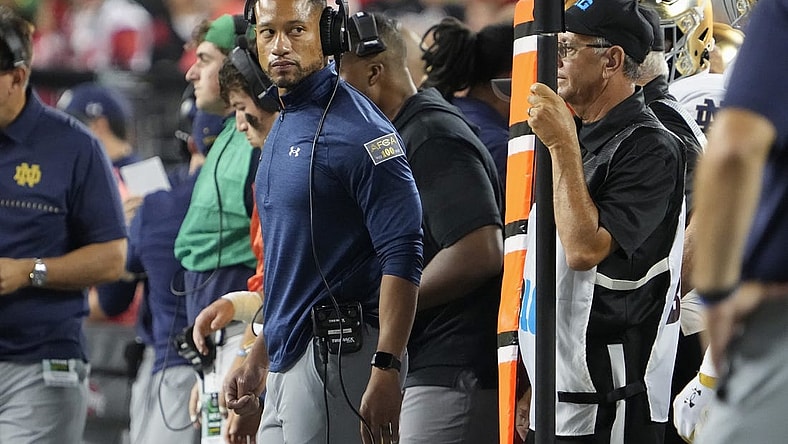 Sep 3, 2022; Columbus, Ohio, USA;  Notre Dame Fighting Irish head coach Marcus Freeman watches from the sideline during the NCAA football game against the Ohio State Buckeyes at Ohio Stadium. Mandatory Credit: Adam Cairns-USA TODAY Sports
