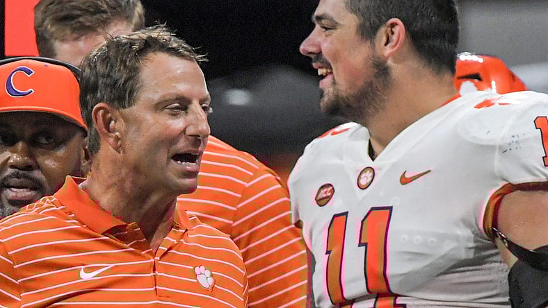 Clemson head coach Dabo Swinney reacts near defensive lineman Bryan Bresee (11) after the game at the Mercedes-Benz Stadium in Atlanta, Georgia Monday, September 5, 2022. Clemson won 41-10.

Ncaa Fb Clemson At Georgia Tech