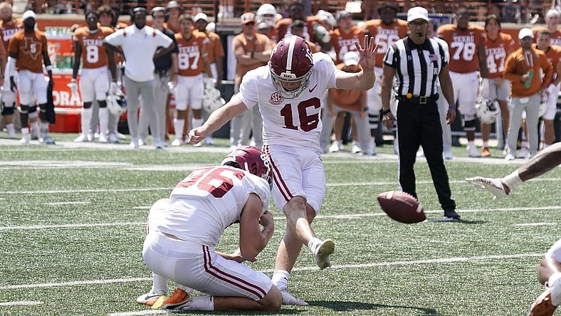 Sep 10, 2022; Austin, Texas, USA; Alabama Crimson Tide kicker Will Reichard (16) kicks the game winning field goal at the end of the second half against the Texas Longhorns at Darrell K Royal-Texas Memorial Stadium. Mandatory Credit: Scott Wachter-USA TODAY Sports
