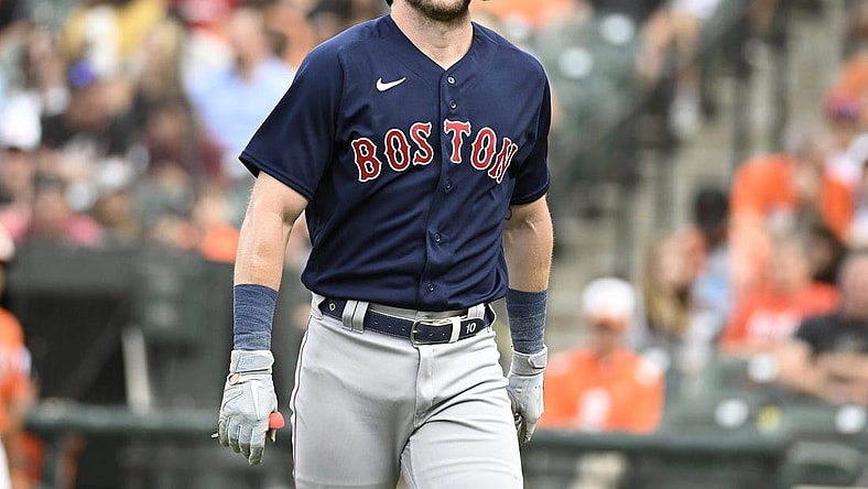 Sep 10, 2022; Baltimore, Maryland, USA;  Boston Red Sox second baseman Trevor Story (10) reacts to being hit by a pitch during the first inning against the Baltimore Orioles at Oriole Park at Camden Yards. Mandatory Credit: James A. Pittman-USA TODAY Sports