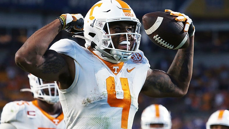 Sep 10, 2022; Pittsburgh, Pennsylvania, USA;  Tennessee Volunteers wide receiver Cedric Tillman (4) reacts after scoring the game winning touchdown against the Pittsburgh Panthers in overtime at Acrisure Stadium.  Tennessee won 34-27 in overtime. Mandatory Credit: Charles LeClaire-USA TODAY Sports