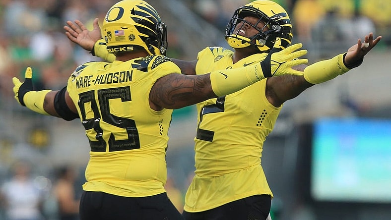 Oregon's Keyon Ware-Hudson, left, and DJ Johnson celebrate a stop against Eastern Washington during the second quarter Saturday Sept 10, 2022.

Eug 091022 Uo Football 08
