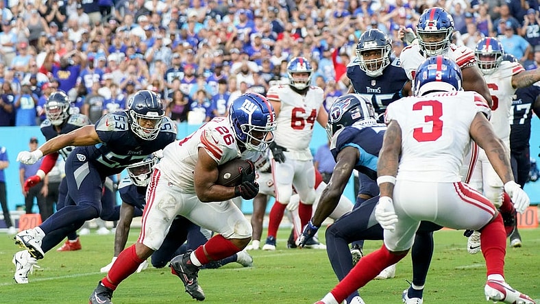 New York Giants running back Saquon Barkley (26) runs for a two-point conversion during the fourth quarter at Nissan Stadium Sunday, Sept. 11, 2022, in Nashville, Tenn.

Nfl New York Giants At Tennessee Titans