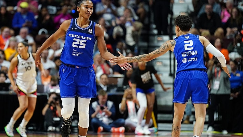 Sep 15, 2022; Uncasville, Connecticut, USA; Connecticut Sun forward Alyssa Thomas (25) reacts with guard Natisha Hiedeman (2) after her basket against the Las Vegas Aces in the second half during game three of the 2022 WNBA Finals at Mohegan Sun Arena. Mandatory Credit: David Butler II-USA TODAY Sports
