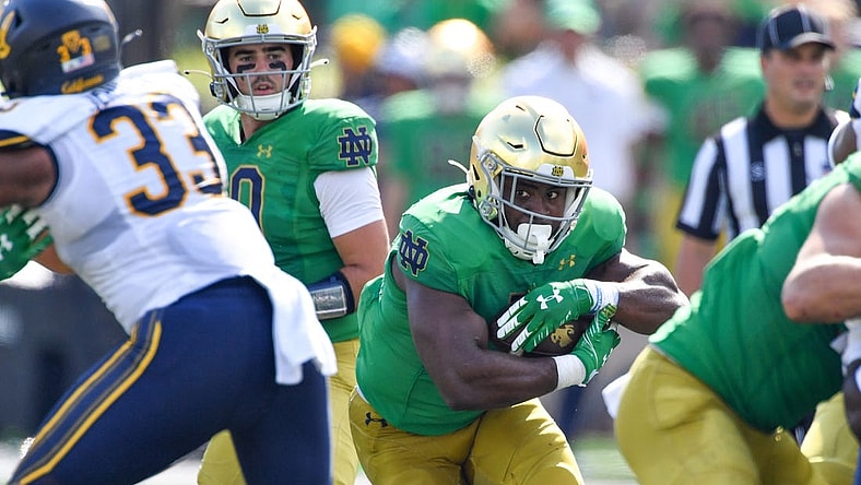 Sep 17, 2022; South Bend, Indiana, USA; Notre Dame Fighting Irish running back Audric Estime (7) runs the ball in the second quarter against the California Bears at Notre Dame Stadium. Mandatory Credit: Matt Cashore-USA TODAY Sports