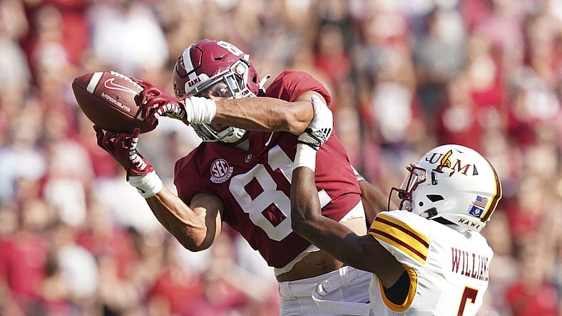 Sep 17, 2022; Tuscaloosa, Alabama, USA; Alabama Crimson Tide tight end Cameron Latu (81) catches a pass against Louisiana Monroe Warhawks safety Tavier Williams (6) at Bryant-Denny Stadium. Mandatory Credit: Marvin Gentry-USA TODAY Sports