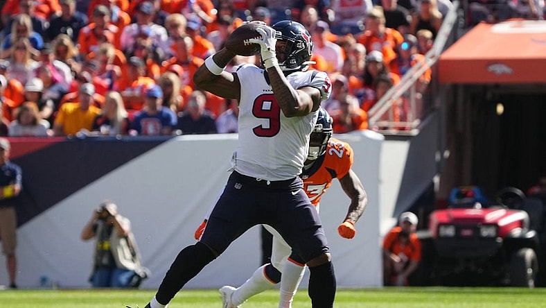 Sep 18, 2022; Denver, Colorado, USA; Houston Texans tight end Brevin Jordan (9) catches the ball in the second quarter against the Denver Broncos at Empower Field at Mile High. Mandatory Credit: Ron Chenoy-USA TODAY Sports