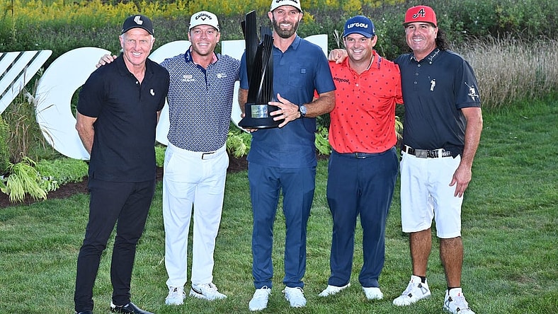 Sep 18, 2022; Chicago, Illinois, USA; LIV Golf CEO Greg Norman, far left, poses with Talor Gooch, Dustin Johnson, Patrick Reed and Pat Perez, all members of the 4 Aces GC, after they won the team competition of the Invitational Chicago LIV Golf tournament at Rich Harvest Farms. Mandatory Credit: Jamie Sabau-USA TODAY Sports
