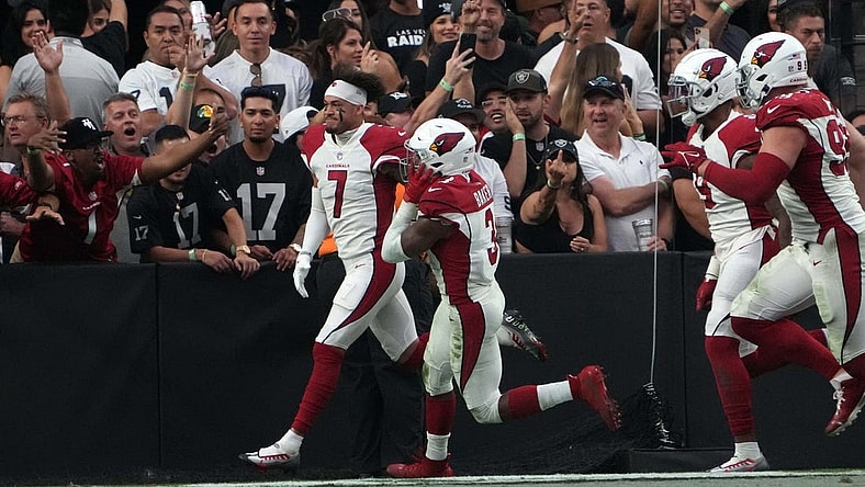 Sep 18, 2022; Paradise, Nevada, USA; Arizona Cardinals cornerback Byron Murphy Jr. (7) celebrates after scoring on a 59-yard fumble recovery in overtime against the Las Vegas Raiders at Allegiant Stadium. Mandatory Credit: Kirby Lee-USA TODAY Sports