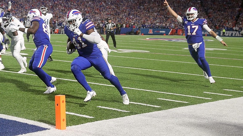Bills fullback Reggie Gilliam his cheered to the end zone by Josh Allen n a 41-7 win over Tennessee.

Ag3i1365