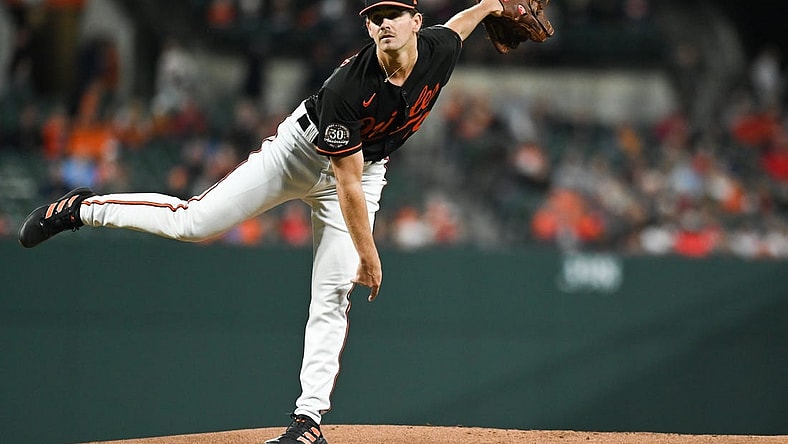 Sep 23, 2022; Baltimore, Maryland, USA;  Baltimore Orioles starting pitcher Dean Kremer (64) follows through on a first inning pitch against the Houston Astros at Oriole Park at Camden Yards. Mandatory Credit: Tommy Gilligan-USA TODAY Sports