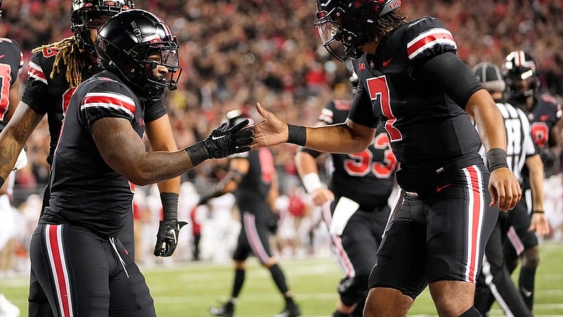 Sep 24, 2022; Columbus, Ohio, USA; Ohio State Buckeyes running back Miyan Williams (3) celebrates scoring a touchdown with quarterback C.J. Stroud (7) during the first half of the NCAA Division I football game against the Wisconsin Badgers at Ohio Stadium. Mandatory Credit: Adam Cairns-The Columbus Dispatch

Ncaa Football Wisconsin Badgers At Ohio State Buckeyes
