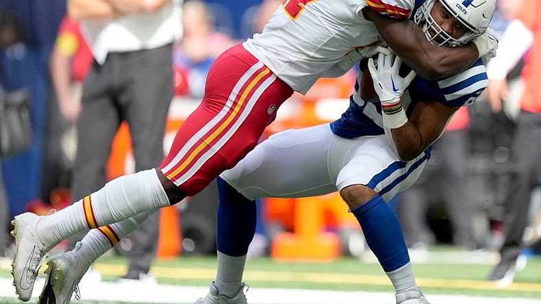 Kansas City Chiefs linebacker Darius Harris (47) tackles Indianapolis Colts tight end Kylen Granson (83) Sunday, Sept. 25, 2022, during a game against the Kansas City Chiefs at Lucas Oil Stadium in Indianapolis.