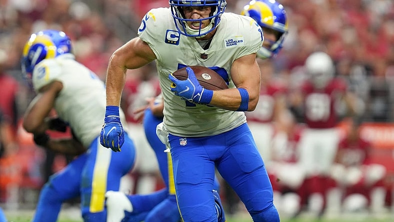 Sep 25, 2022; Glendale, AZ, USA; Los Angeles Rams receiver Cooper Kupp (10) runs in for a touchdown against the Arizona Cardinals at State Farm Stadium. Mandatory Credit: Joe Rondone-Arizona Republic