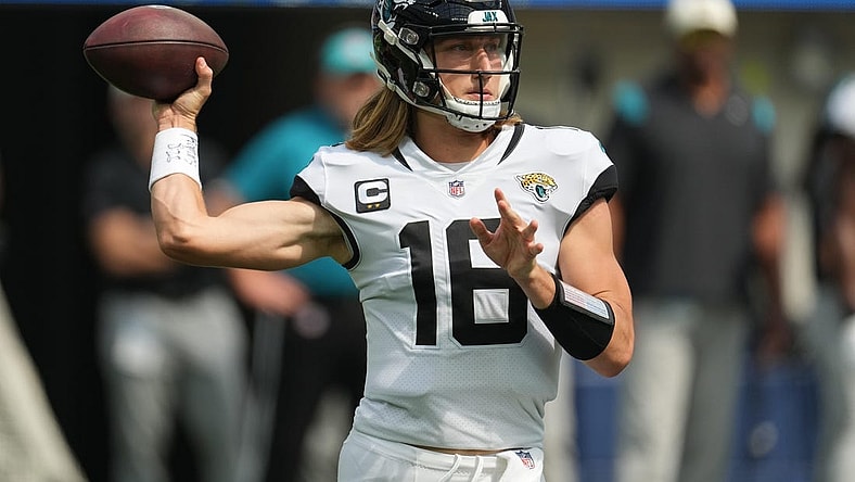 Sep 25, 2022; Inglewood, California, USA; Jacksonville Jaguars quarterback Trevor Lawrence (16) throws the ball against the Los Angeles Chargers in the first half at SoFi Stadium. Mandatory Credit: Kirby Lee-USA TODAY Sports