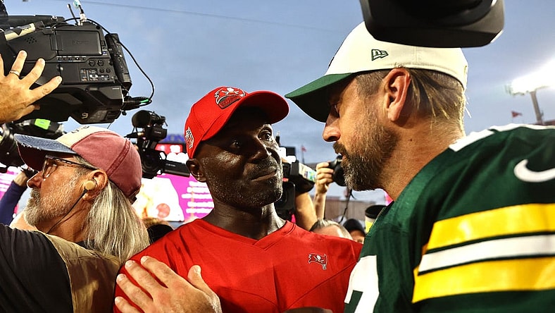 Sep 25, 2022; Tampa, Florida, USA; Tampa Bay Buccaneers head coach Todd Bowles and Green Bay Packers quarterback Aaron Rodgers (12) greet after the game at Raymond James Stadium. Mandatory Credit: Kim Klement-USA TODAY Sports