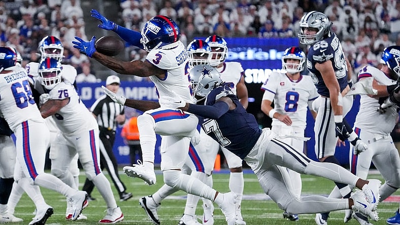 Sep 26, 2022; East Rutherford, NJ, USA;  Dallas Cowboys cornerback Trevon Diggs (7) defends the pass intended for New York Giants wide receiver Sterling Shepard (3) during the first quarter at MetLife Stadium. Mandatory Credit: Robert Deutsch-USA TODAY Sports