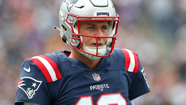 Sep 25, 2022; Foxborough, Massachusetts, USA; New England Patriots quarterback Mac Jones (10) reacts during the first half against the Baltimore Ravens at Gillette Stadium. Mandatory Credit: Paul Rutherford-USA TODAY Sports