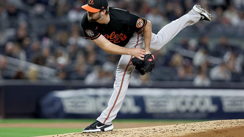 Sep 30, 2022; Bronx, New York, USA; Baltimore Orioles starting pitcher Jordan Lyles (28) follows through on a pitch against the New York Yankees during the first inning at Yankee Stadium. Mandatory Credit: Brad Penner-USA TODAY Sports