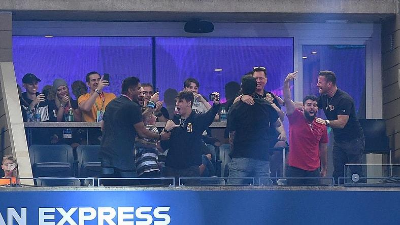 Jul 28, 2019; Flushing, NY, USA; Fans of player Dubs celebrate after his victory in the third round of six at the Fortnite World Cup Finals e-sports event at Arthur Ashe Stadium. Mandatory Credit: Dennis Schneidler-USA TODAY Sports