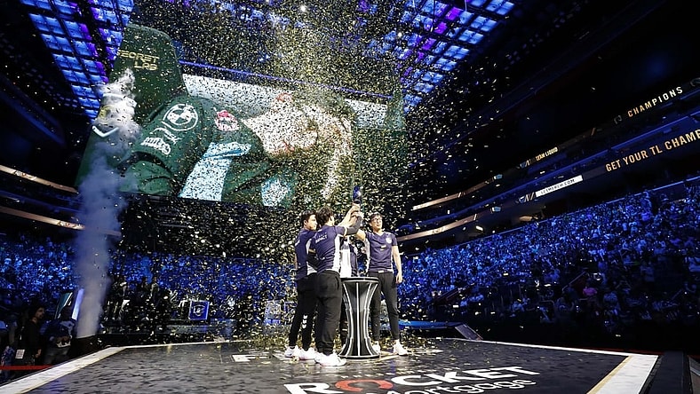 Aug 25, 2019; Detroit, MI, USA; Team Liquid celebrate and lift the trophy after winning the LCS Summer Finals event against Cloud9 at Little Caesars Arena. Mandatory Credit: Raj Mehta-USA TODAY Sports