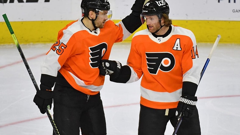 May 10, 2021; Philadelphia, Pennsylvania, USA; Philadelphia Flyers left wing James van Riemsdyk (25) celebrates his goal with center Sean Couturier (14) against the New Jersey Devils during the third period at Wells Fargo Center. Mandatory Credit: Eric Hartline-USA TODAY Sports