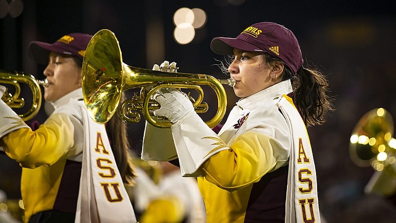 A member of the Arizona State University marching band plays a trumpet during a halftime show at Sun Devil Stadium in Tempe on Oct. 8, 2021. Monica D. Spencer/The Republic 6029647001

Asu Stanford Football Game 6029647001 10