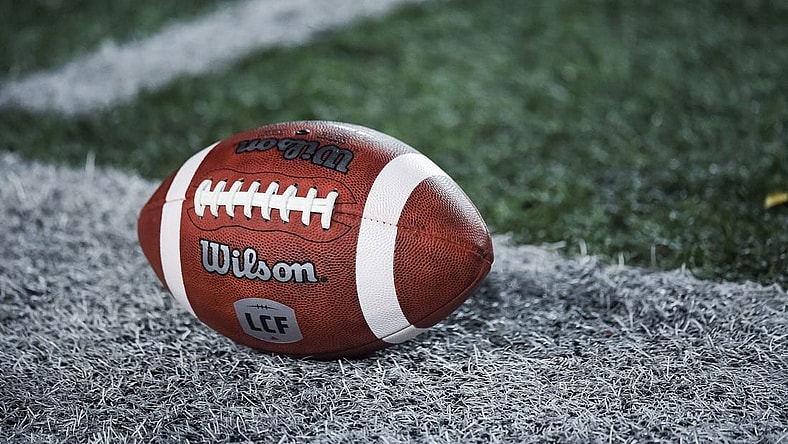 Oct 22, 2021; Montreal, Quebec, CAN; view of a CFL game ball with a french logo on the field before the first quarter during a Canadian Football League game at Molson Stadium. Mandatory Credit: David Kirouac-USA TODAY Sports