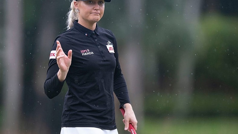 Charley Hull (ENG) walks off the green on the 11th hole during the first round of the LPGA's CME Group Tour Championship, Thursday, Nov. 18, 2021, at Tibur  n Golf Club at the Ritz-Carlton Golf Resort in Naples, Fla.

LPGA's CME Group Tour Championship first round