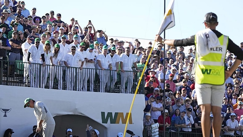 Feb 11, 2022; Scottsdale, Arizona, USA; Rickie Fowler putts on the 16th green during Round 2 of the WM Phoenix Open at TPC Scottsdale.
Pga Phoenix Open