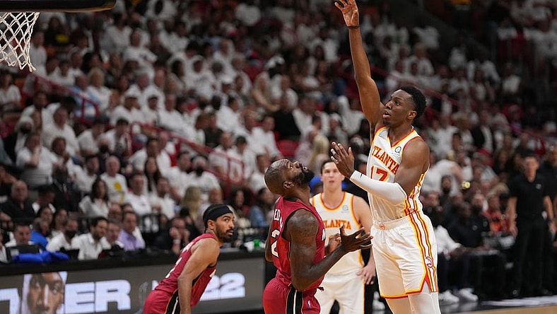Apr 26, 2022; Miami, Florida, USA; Atlanta Hawks forward Onyeka Okongwu (17) puts up a shot over Miami Heat center Dewayne Dedmon (21) during the first half in game five of the first round for the 2022 NBA playoffs at FTX Arena. Mandatory Credit: Jasen Vinlove-USA TODAY Sports