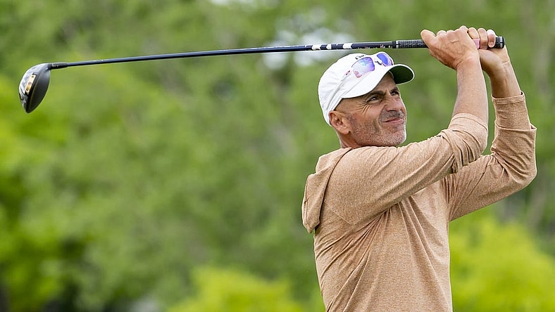 May 26, 2022; Benton Harbor, Michigan, USA; Rocco Mediate hits his tee shot on the eighth hole during the first round of the 2022 KitchenAid Senior PGA Championship at Harbor Shores. Mandatory Credit: Raj Mehta-USA TODAY Sports