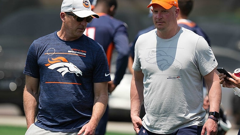 Jun 13, 2022; Englewood, CO, USA; Denver Broncos general manager George Paton and head coach Nathaniel Hackett during mini camp drills at the UCHealth Training Center. Mandatory Credit: Ron Chenoy-USA TODAY Sports