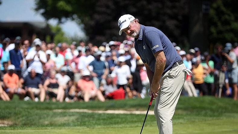 Jerry Kelly watches as his putt for par falls into the cup to win the Bridgestone Senior Players Championship at Firestone Country Club on Sunday.

Bridgestone 4