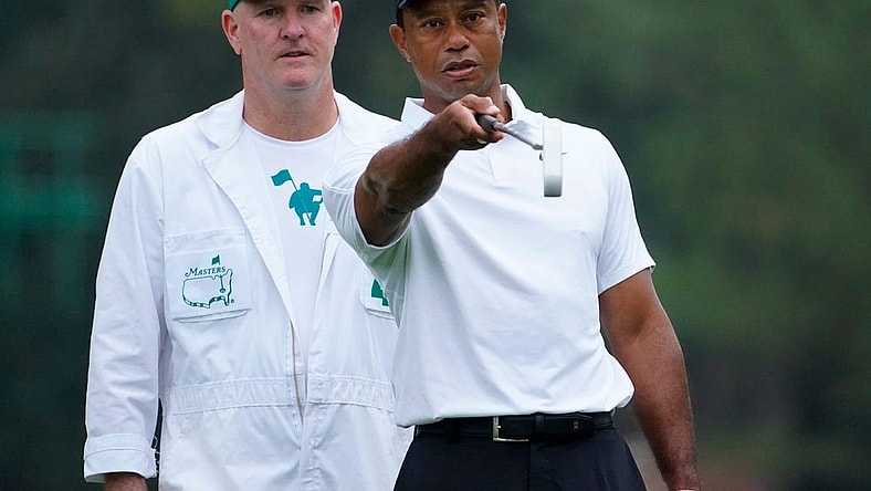 Tiger Woods talks with caddie Joe LaCava during a practice round at Augusta National.

Syndication Usa Today
