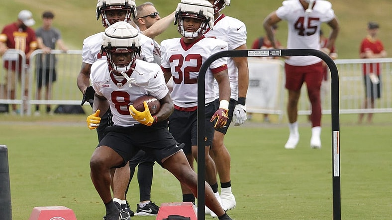 Jul 29, 2022; Ashburn, VA, USA; Washington Commanders running back Brian Robinson (8) participates in drills during day three of training camp at the Park in Ashburn. Mandatory Credit: Geoff Burke-USA TODAY Sports