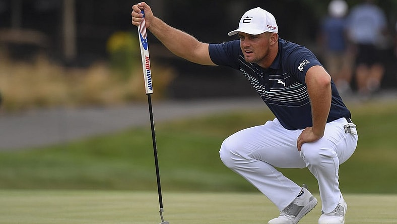 Jul 29, 2022; Bedminster, New Jersey, USA;  Bryson DeChambeau lines up a putt on the 9th green during the first round of a LIV Golf tournament at Trump National Golf Club Bedminster. Mandatory Credit: John Jones-USA TODAY Sports