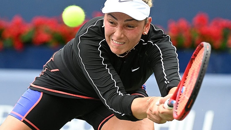 Aug 8, 2022; Toronto, ON, Canada;   Donna Vekic (CRO) plays a shot against Simona Halep (ROU) in first round play in the National Bank Open at Sobeys Stadium. Mandatory Credit: Dan Hamilton-USA TODAY Sports