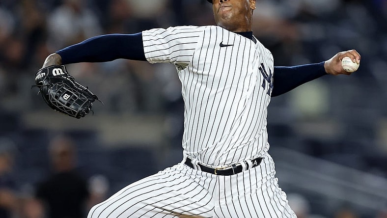 Aug 17, 2022; Bronx, New York, USA; New York Yankees relief pitcher Aroldis Chapman (54) pitches against the Tampa Bay Rays during the tenth inning at Yankee Stadium. Mandatory Credit: Brad Penner-USA TODAY Sports