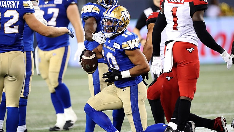 Aug 25, 2022; Winnipeg, Manitoba, CAN;  Winnipeg Blue Bombers wide receiver Nic Demski (10) celebrates after a run during the second half against the Calgary Stampeders at IG Field. Winnipeg wins 31-29. Mandatory Credit: Bruce Fedyck-USA TODAY Sports
