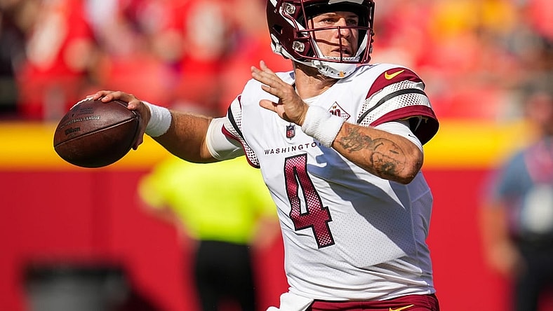 Aug 20, 2022; Kansas City, Missouri, USA; Washington Commanders quarterback Taylor Heinicke (4) throws a pass against the Kansas City Chiefs during the second half at GEHA Field at Arrowhead Stadium. Mandatory Credit: Jay Biggerstaff-USA TODAY Sports