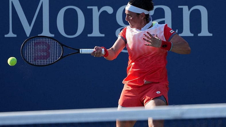 Aug 29, 2022; Flushing, NY, USA; Ons Jabeur of Tunisia hits a shot against Madison Brengle of the United States on day one of the 2022 U.S. Open tennis tournament at USTA Billie Jean King National Tennis Center. Mandatory Credit: Jerry Lai-USA TODAY Sports