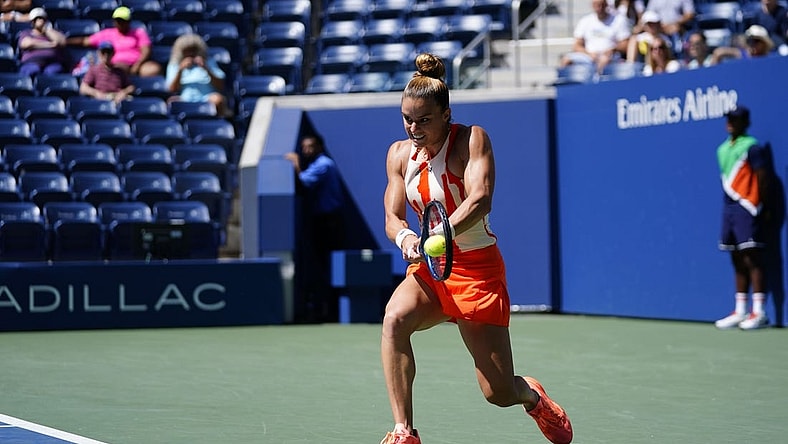 Aug 31, 2022; Flushing, NY, USA; Maria Sakkari of Greece hits to Xiyu Wang of China on day three of the 2022 U.S. Open tennis tournament at USTA Billie Jean King Tennis Center. Mandatory Credit: Danielle Parhizkaran-USA TODAY Sports