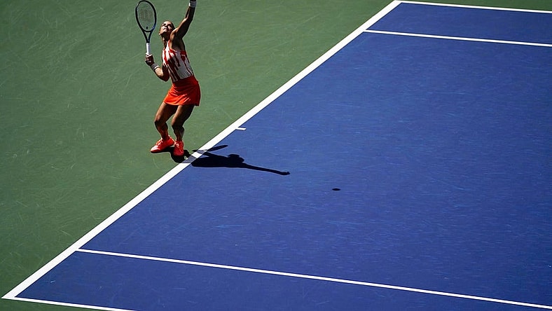 Aug 31, 2022; Flushing, NY, USA; Maria Sakkari of Greece serves to Xiyu Wang of China on day three of the 2022 U.S. Open tennis tournament at USTA Billie Jean King Tennis Center. Mandatory Credit: Danielle Parhizkaran-USA TODAY Sports