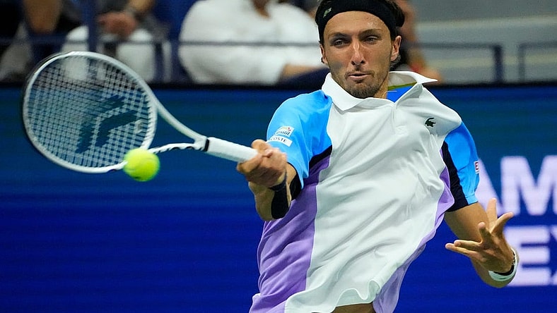 Aug 31, 2022; Flushing, NY, USA;   Arthur Rinderknech of France hits to Daniil Medvedev on day three of the 2022 U.S. Open tennis tournament at USTA Billie Jean King National Tennis Center. Mandatory Credit: Robert Deutsch-USA TODAY Sports