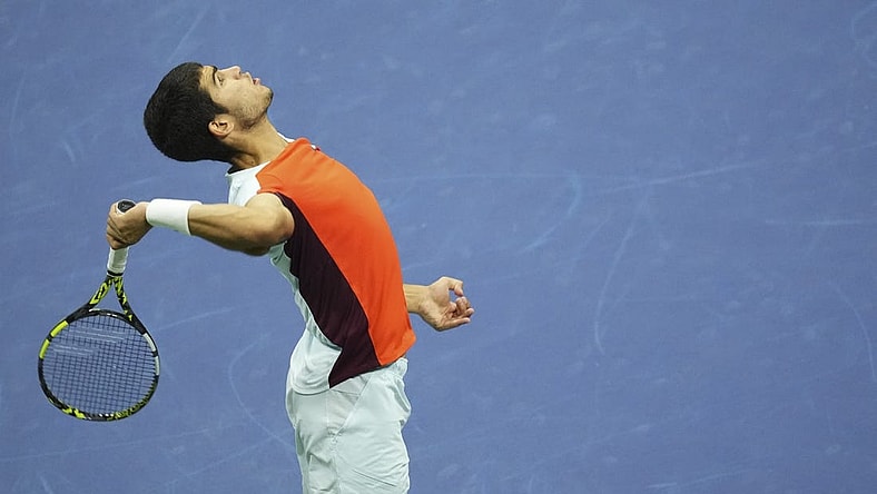 Sep 11, 2022; Flushing, NY, USA; Carlos Alcaraz (ESP) serves against Casper Ruud (NOR) (not pictured) in the men's singles final on day fourteen of the 2022 U.S. Open tennis tournament at USTA Billie Jean King Tennis Center. Mandatory Credit: Danielle Parhizkaran-USA TODAY Sports